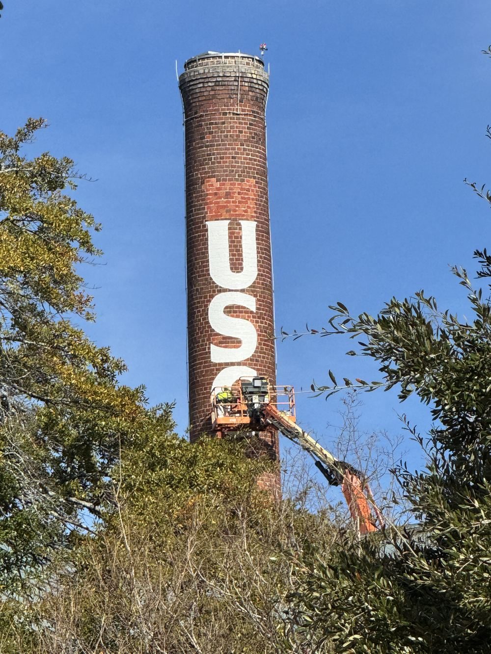 ECHERER crew applying industrial coatings on the USC smokestack