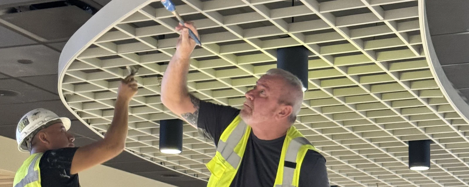 ECHERER painters finishing a curved commercial ceiling, Columbia SC