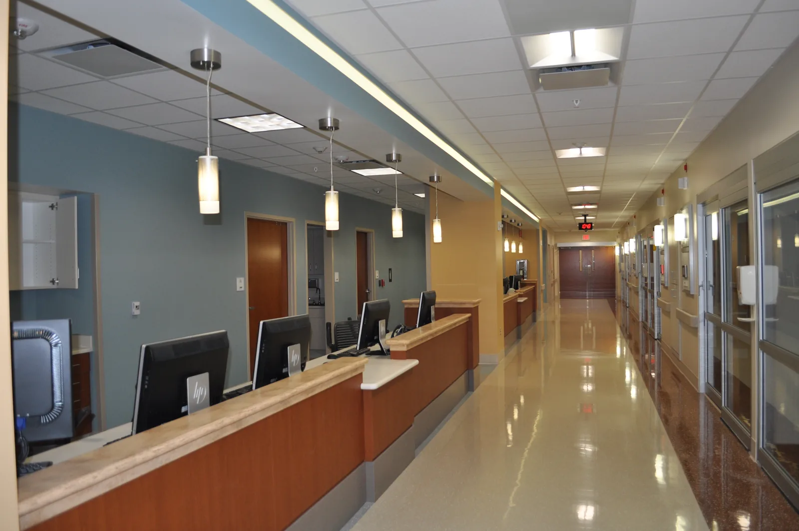 Finished hospital corridor and nurses station painted by ECHERER