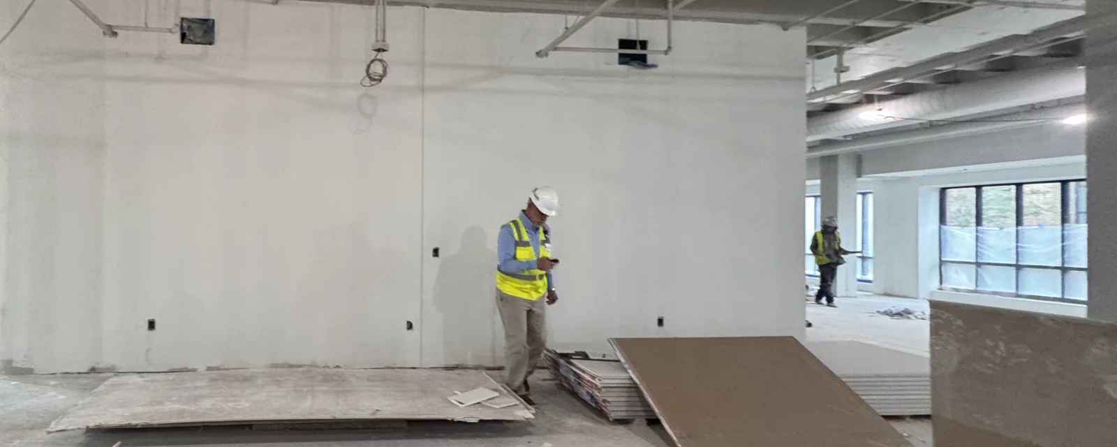 Commercial office interior buildout in progress, ECHERER crew on site